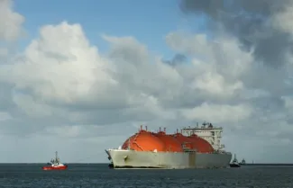 gas-tanker-entering-harbour-with-help-of-tug-boat
