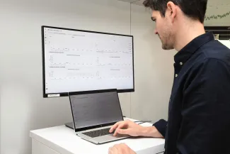 EnergyVille colleague working at a computer