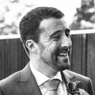 Black and white picture of a man, looking away from the camera
